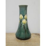 A Mintons Ltd pottery vase, of tapering form, decorated with flowers on a turquoise ground, 24 cm