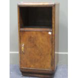 An Art Deco walnut bedside cabinet with an open shelf over a single cupboard door 73 x 36 x 37cm and