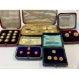 five sets of cufflinks, shirt studs and buttons, coral backs tested as 9ct gold and foliate engraved