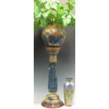 A Royal Doulton pottery vase, in Art Nouveau style, 32cm high, and a planter with stand, 70cm