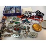 A collection of beads, costume and silver jewellery, together with a hallmarked silver Charles