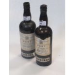 Sandeman's vintage port 1945, 2 bottles, (one with depressed cork and low shoulder level; the