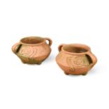 Carter & Co for Liberty, a pair of terracotta jardinieres, designed by Archibald Knox,