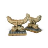 Robert Wallace Martin for the Martin Brothers, a rare and important pair of stoneware andirons,