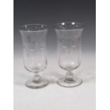 A pair of glass celery vases, approx 22cm high