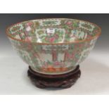 A 20th century Cantonese famille rose bowl with a standCondition report: Without base is 20cm tall