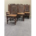 Six carved oak dining chairs all stamped to the rail,'Robert Sturdy Husthwaite 1890' (6)