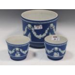 A Wedgwood blue jasperware jardiniere and a pair of cache pots (3)Condition report: See images for