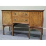 A 20th century crossbanded mahogany sideboard comprising of two drawers flanked by two cupboard