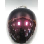 A large 20th century purple glass bauble