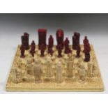 A chess set comprising gnomes and fantastical characters as the pieces