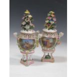 A pair of Meissen style floral encrusted pot pourri vases, 33cm highCondition report: Both lids have