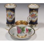 A pair of Dresden type floral painted spill vases, and a Continental cabinet cup and saucer