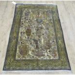 A Persian yellow ground silk rug, 170 x 107cm