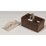 A hardstone cigar box with ivory finial and small marble carving of child lying down