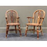 A pair of childs wheel back windsor armchairs