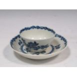 An 18th century Worcester blue and white teabowl and saucer
