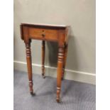 A 19th century mahogany work table on turned legs, 73 x 36 x 43cm, together with brass stick stand