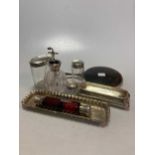 A collection of lady's silver requisites including a tortoiseshell backed mirror, three silver