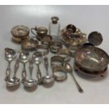 A collection of silverware including napkin rings, flatware dishes, condiments, trinket boxes etc