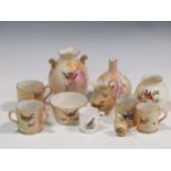 A collection of Royal Worcester miniature porcelain, to include two jugs, two mugs and two three-