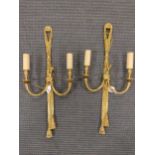 A pair of modern gilt metal twin branch wall lights, purchased from The Mandarin Oriental Hotel,