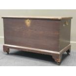 A simulated oak stained pine blanket chest, on bracket feet and castors, 19th century,60 x 92 x 55cm