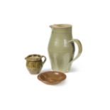 St Ives Pottery, a celadon glazed water jug, impressed seal mark; together with another smaller St