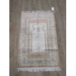 A silk Hereke rug 161 x 89cm