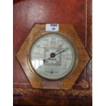 An early 19th century wheel barometer, inscribed 'D Fagioli & Sons, Great Warner Street