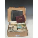 A post card album together with nearly 1000 loose postcards, together with Syrian photographs and