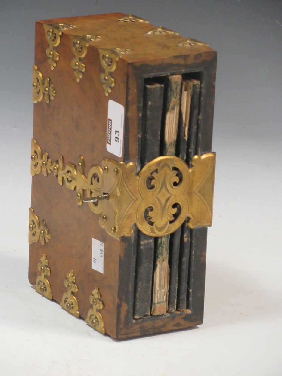 A Victorian walnut and brass bound desk top journal holder