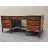 A mahogany pedestal desk with black leather inset surface, and brass handlesCondition report: 74 x