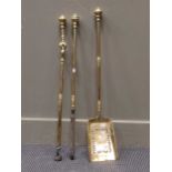 A set of Georgian brass fire irons comprising of a poker, tongs and a shovel with pierced pan,