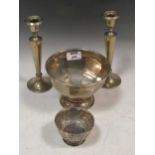 Two bon bon dishes, largest 11 tall x 16cm diameter, with a pair of silvered candle sticks