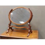 A mahogany oval toilet mirror, and another 19th century toilet mirror with three drawer base (2)