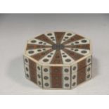 A Middle Eastern ivory inlaid octagonal box, 12.5cm wide