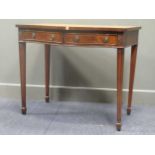 An Edwardian mahogany serpentine writing table 76 x 92 x 57cm