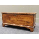 A late 18th/ early 19th century elm blanket box raised on bracket feet, 38 x 81 x 36cm