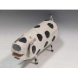 Peter Rafuse (B.1949), a carved wooden folk art pig, signed 'Peter Rafuse' (to the underside),