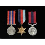 A trio of World War II medals,