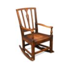 An elm country rocking chair, 19th century,