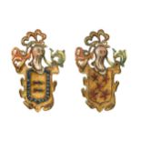 A pair of carved and painted wooden coats of arms, late 19th / early 20th century,