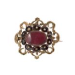 A Georgian garnet memorial brooch,