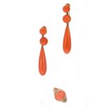 A pair of coral ear pendants together with a coral ring,