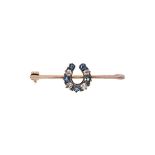 A Victorian sapphire and diamond horseshoe brooch,