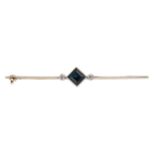 A sapphire and diamond bar brooch,