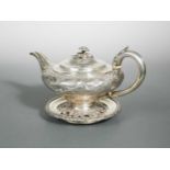 A George IV silver teapot and stand,