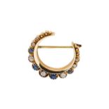 A Victorian sapphire and diamond crescent brooch,