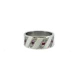 An 18ct white gold ruby and diamond set ring,